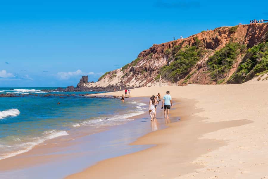 From Natal: Pipa, Cacimbinhas, And Love Beach Full-Day Tour - Packing for stairs, cliffs, and hot sand