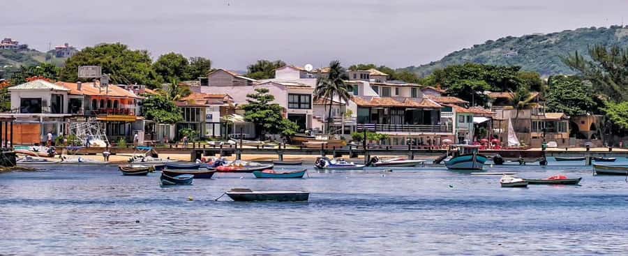 From Rio: Buzios Beaches Day Trip with Boat Ride and Lunch - Guide service and language