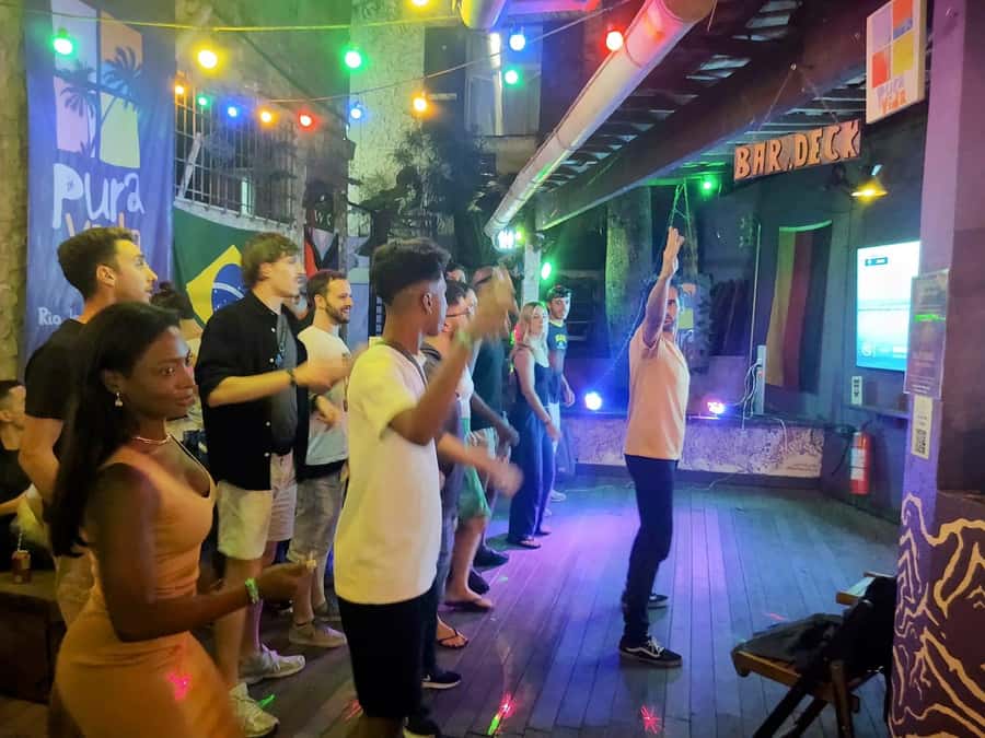 Latin Music Dance Class + DJs + 2 Free Drinks - The two-drink start and Deck Bar setting