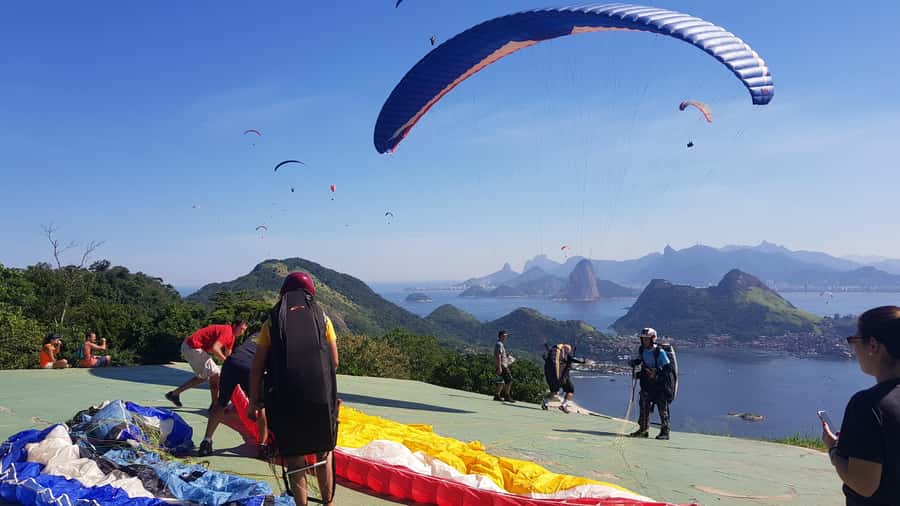 Niterói: Paragliding Experience with GoPro Photos and Video - Flying above Niterói with Rio in the distance