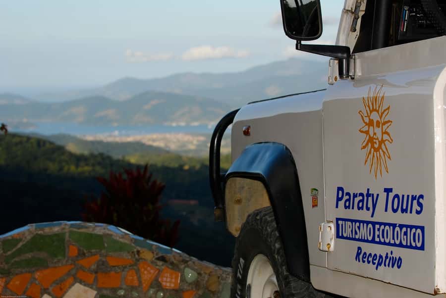 Paraty: Jungle Waterfalls and Cachaça Distillery Jeep Tour - Tobogã Waterfall, where locals surf the rock