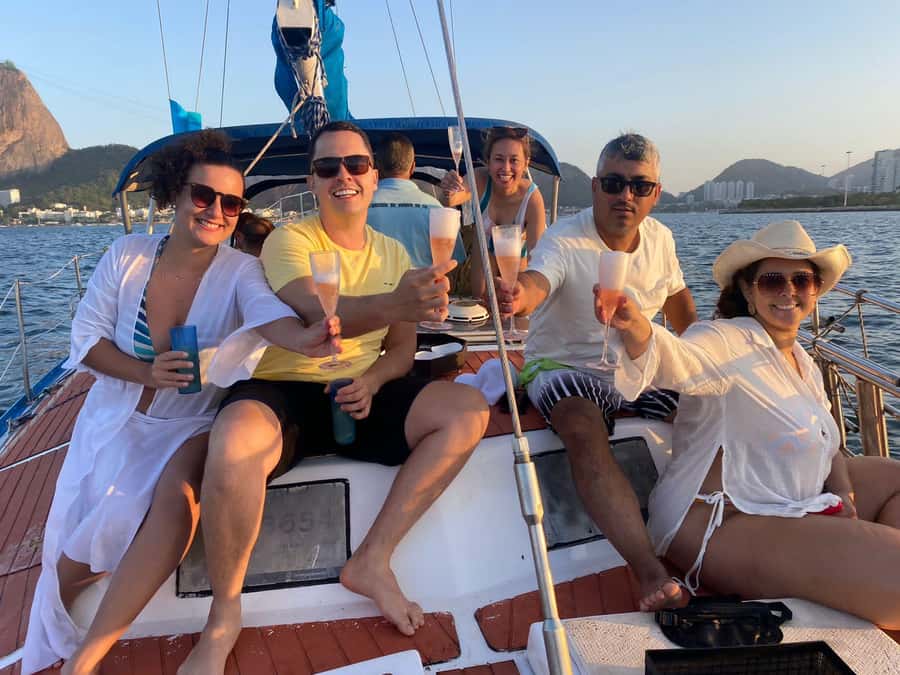 Rio de Janeiro: Sunset Sailboat Tour with Open Bar - Swimming from the sailboat