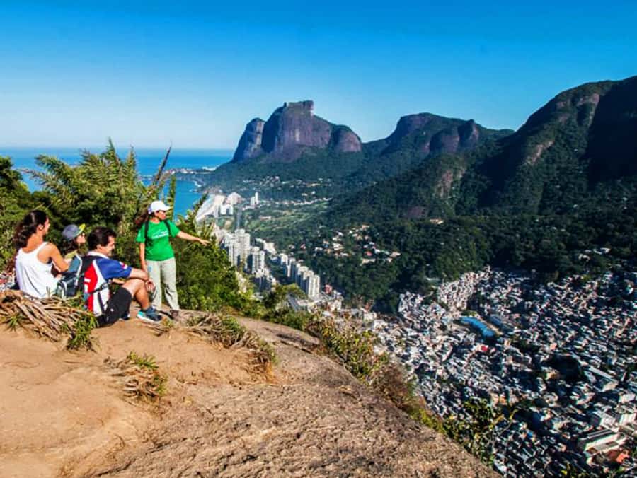Rio de Janeiro: Vidigal Favela Tour and Two Brothers Hike - Riding through Vidigal to reach the trail